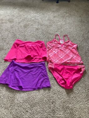 Size 16 girls swimsuit with two swim skirts